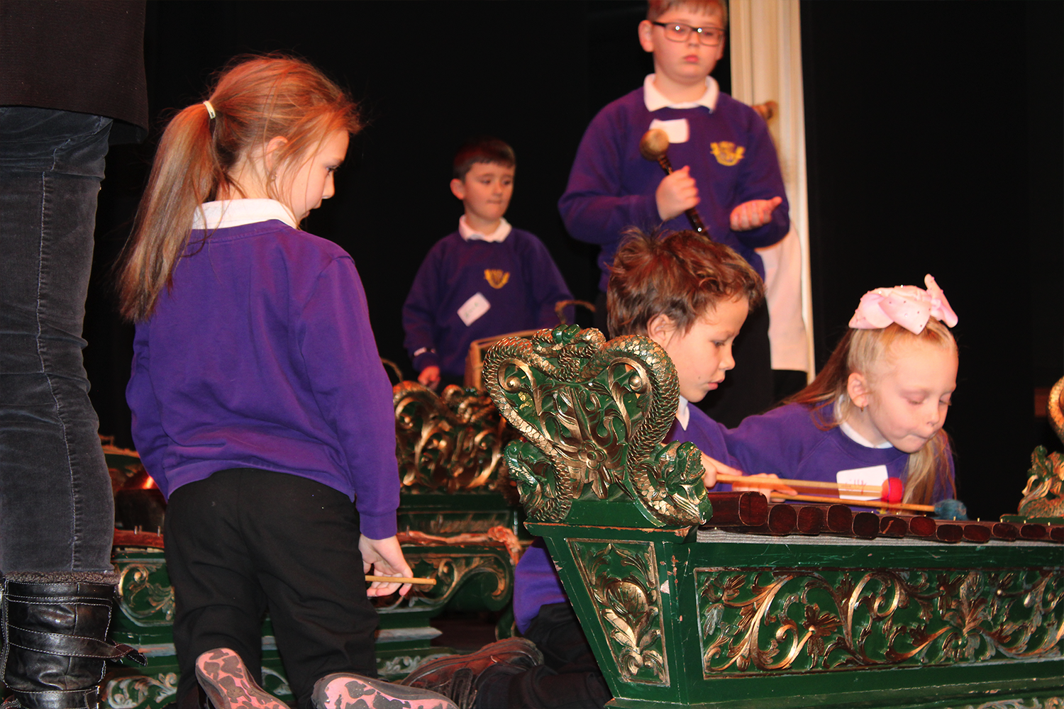 Schoolchildren play gamelan instruments in Lincolnshire